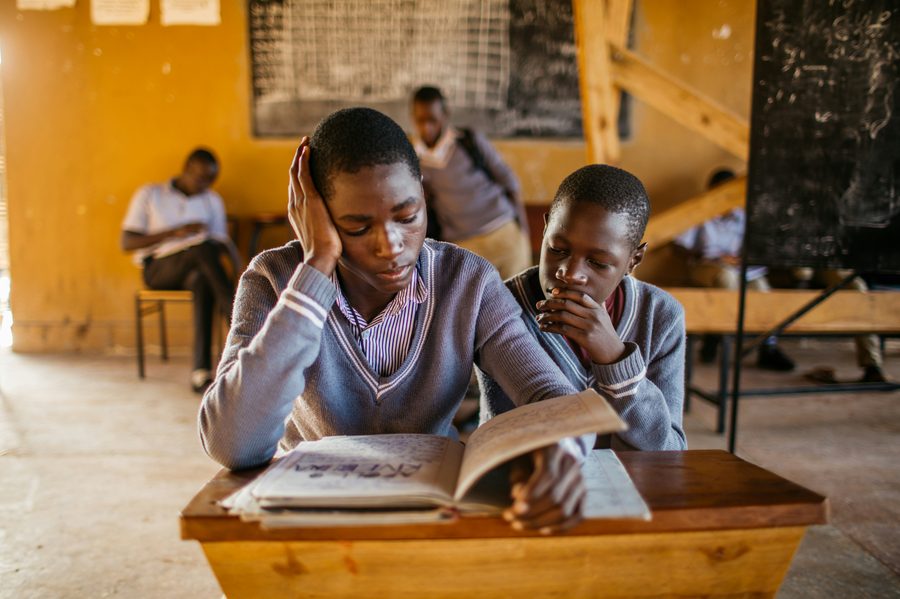 Two students learning together at a desk